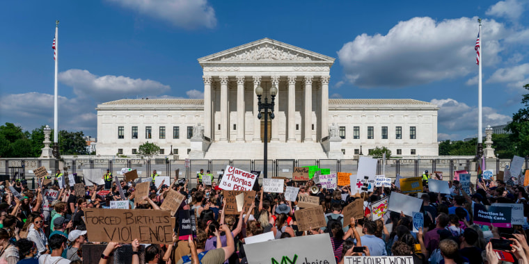 Abortion rights and anti-abortion demonstrators gather outside of the Supreme Court