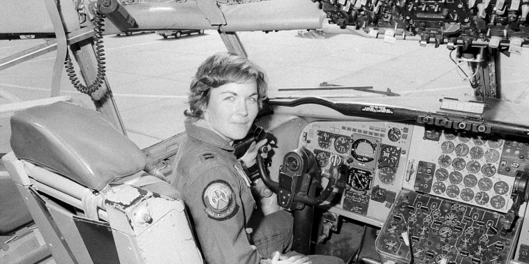Captain  Linda M. Phillips, 97th Air Refueling Squadron, sits at the controls of an aircraft.  She is the first female instructor pilot in the Strategic Air Command.